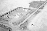 Aerial photograph of a farm in Saskatchewan (45-15-W3)