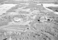 Aerial photograph of a farm in Saskatchewan (32-45-15-W3)