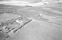 Aerial photograph of a farm in Saskatchewan (34-45-15-W3)