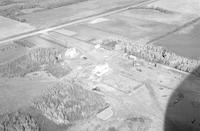 Aerial photograph of a farm in Saskatchewan (10-46-17-W3)