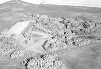 Aerial photograph of a farm near Meota, SK (46-18-W3)