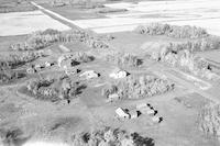 Aerial photograph of a farm near Meota, SK (46-18-W3)