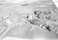 Aerial photograph of a farm in Saskatchewan (46-18-W3)