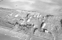 Aerial photograph of a farm near Meota, SK (46-18-W3)