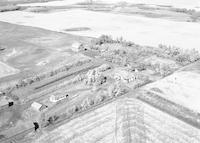 Aerial photograph of a farm in Saskatchewan (47-13-W3)
