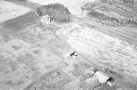 Aerial photograph of a farm in Saskatchewan (47-17-W3)