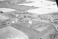 Aerial photograph of a farm near Cavalier, SK (47-18-W3)