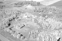 Aerial photograph of a farm near Meota, SK (47-18-W3)