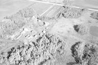 Aerial photograph of a farm in Saskatchewan (47-21-W3)