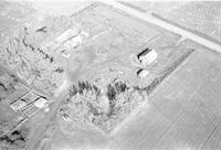 Aerial photograph of a farm in Saskatchewan (14-47-21-W3)