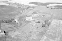 Aerial photograph of a farm near Jackfish Lake, SK (48-18-W3)