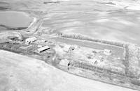 Aerial photograph of a farm in Saskatchewan (48-18-W3)