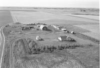 Aerial photograph of a farm near Kerrobert, SK (34-21-W3)