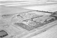 Aerial photograph of a farm near Kerrobert, SK (34-21-W3)