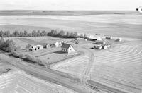 Aerial photograph of a farm near Kerrobert, SK (34-21-W3)