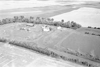 Aerial photograph of a farm near Kerrobert, SK (34-21-W3)