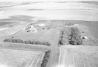 Aerial photograph of a farm near Kerrobert, SK (34-21-W3)