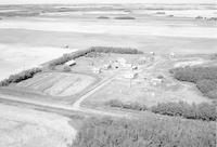 Aerial photograph of a farm in Saskatchewan (38-11-W3)