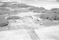 Aerial photograph of a farm in Saskatchewan (38-11-W3)