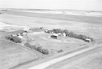 Aerial photograph of a farm in Saskatchewan (38-11-W3)