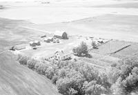 Aerial photograph of a farm in Saskatchewan (38-11-W3)