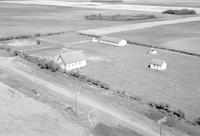 Aerial photograph of a farm in Saskatchewan (38-11-W3)