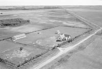 Aerial photograph of a farm in Saskatchewan (38-11-W3)