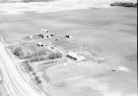 Aerial photograph of a farm in Saskatchewan (38-12-W3)