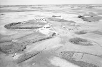 Aerial photograph of a farm in Saskatchewan (38-12-W3)