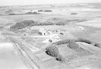 Aerial photograph of a farm in Saskatchewan (38-12-W3)