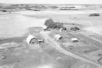 Aerial photograph of a farm in Saskatchewan (38-12-W3)