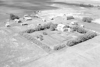 Aerial photograph of a farm in Saskatchewan (38-12-W3)