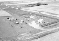 Aerial photograph of a farm in Saskatchewan (38-12-W3)