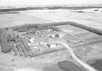 Aerial photograph of a farm in Saskatchewan (38-12-W3)