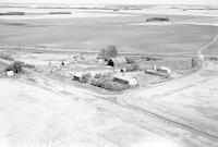 Aerial photograph of a farm in Saskatchewan (38-12-W3)