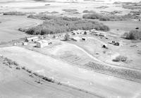 Aerial photograph of a farm in Saskatchewan (40-12-W3)