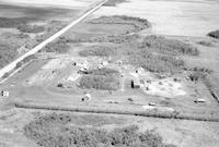 Aerial photograph of a farm in Saskatchewan (43-15-W3)