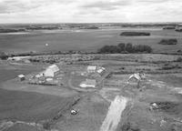 Aerial photograph of a farm in Saskatchewan (44-6-W3)