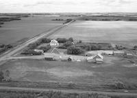 Aerial photograph of a farm in Saskatchewan (44-6-W3)