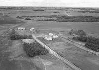 Aerial photograph of a farm in Saskatchewan (12-44-6-W3)