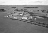 Aerial photograph of a farm in Saskatchewan (12-44-6-W3)