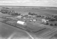 Aerial photograph of a farm in Saskatchewan (26-44-6-W3)