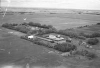 Aerial photograph of a farm in Saskatchewan (21-44-6-W3)