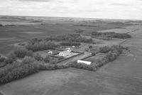 Aerial photograph of a farm in Saskatchewan (21-44-6-W3)