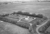 Aerial photograph of a farm in Saskatchewan (21-44-6-W3)