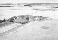 Aerial photograph of a farm in Saskatchewan (36-44-7-W3)