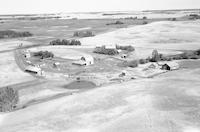 Aerial photograph of a farm in Saskatchewan (26-44-7-W3)