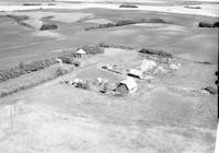 Aerial photograph of a farm in Saskatchewan (30-44-7-W3)