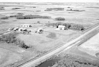 Aerial photograph of a farm in Saskatchewan (13-44-7-W3)