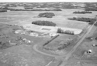 Aerial photograph of a farm in Saskatchewan (44-10-W3)